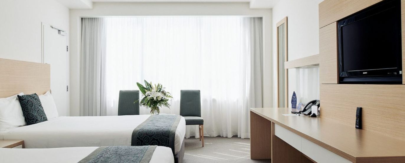 Deluxe Room with tropical colour palette at The Ville